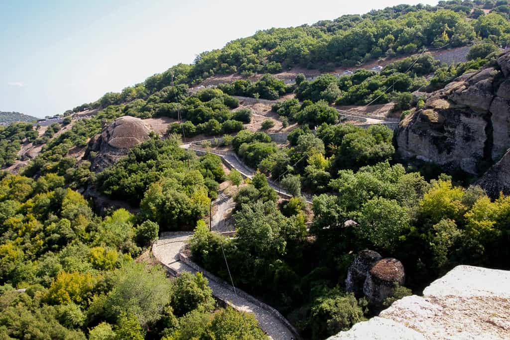 The path you have to walk down (!!!) before even starting your hike up to the Holy Trinity Monastery at the Meteora Monasteries The path you have to walk down (!!!) before even starting your hike up to the Holy Trinity Monastery at the Meteora Monasteries