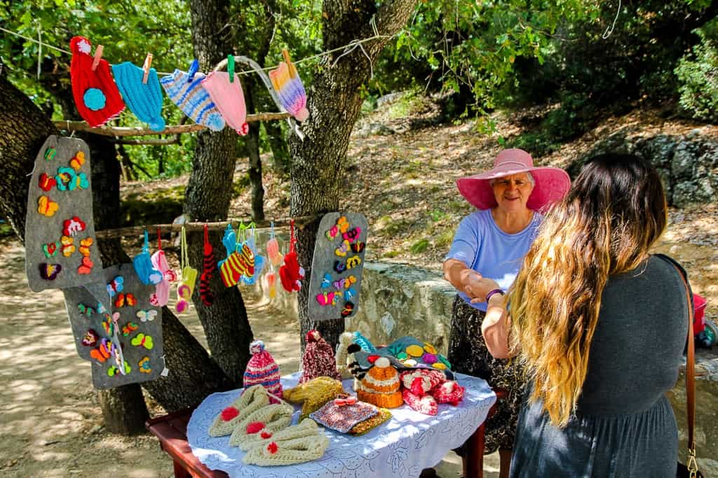 Woman selling handmade goods at St. Nicholas Woman selling handmade goods at St. Nicholas