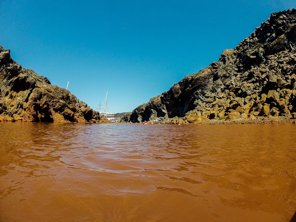 swimming in the hot springs is one of the things to do in santorini