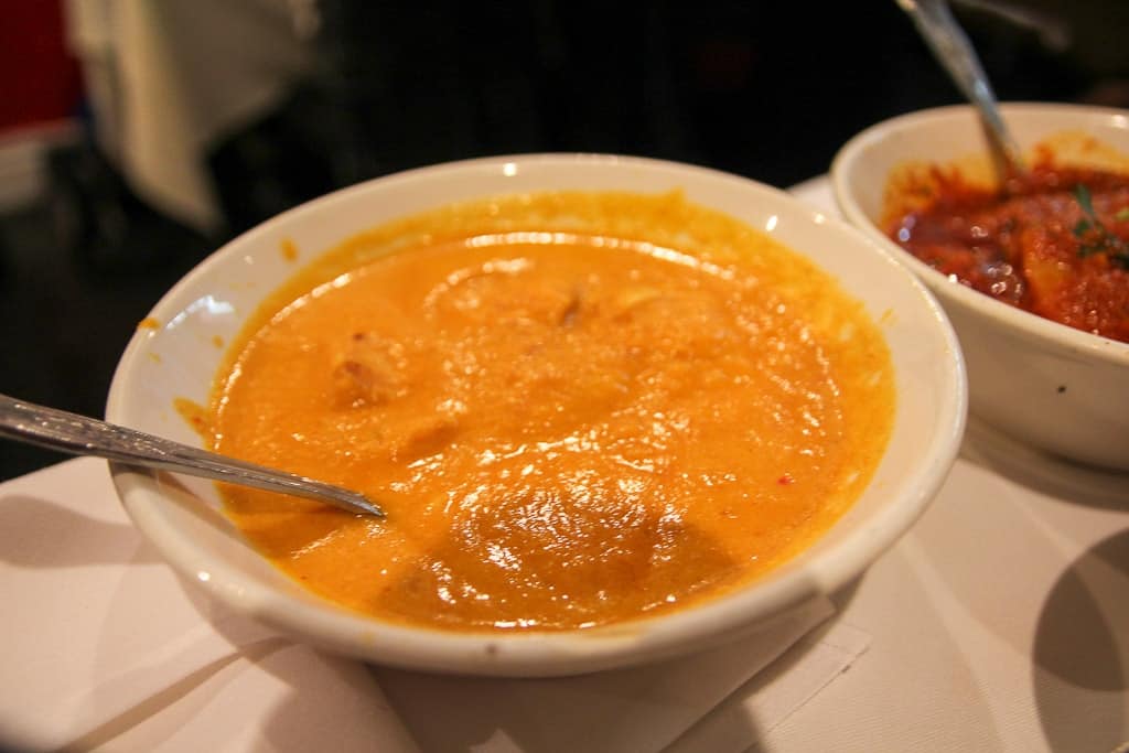 A curry on brick lane is one of the food experiences to have in London