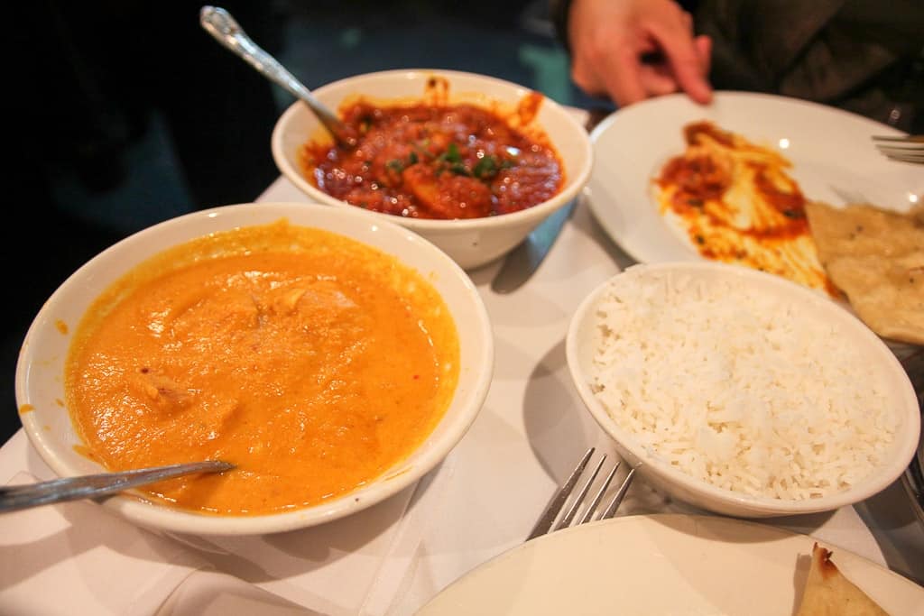 A curry on brick lane is one of the food experiences to have in London