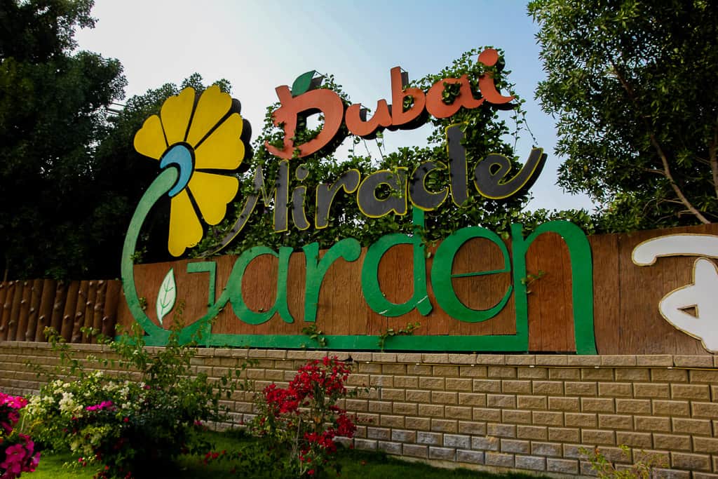 Entrance sign at the Dubai Miracle Garden Entrance sign at the Dubai Miracle Garden