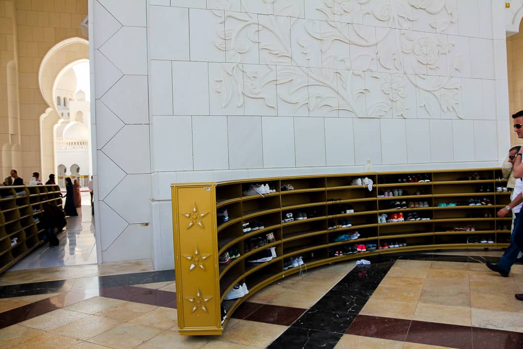 The shoe racks where you have to leave your shoes before entering the mosque