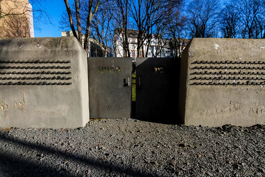 The entrance to the cemetery as part of the memorial wall The entrance to the cemetery as part of the memorial wall