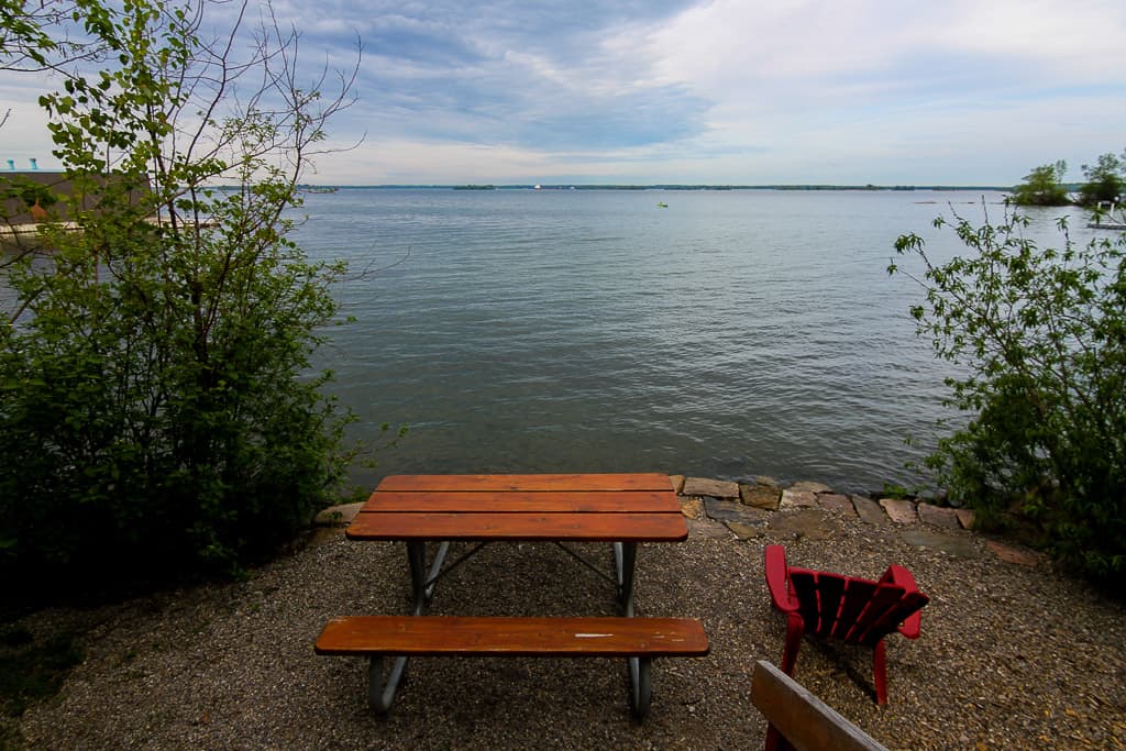 The view we had of the lake quite literally outside of our door + the picnic table and a Muskoka chair