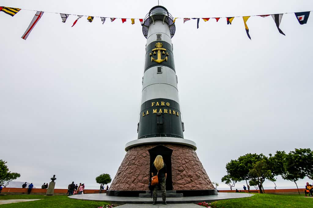 Taking selfies with the La Marina Lighthouse is one of the things to do in Miraflores