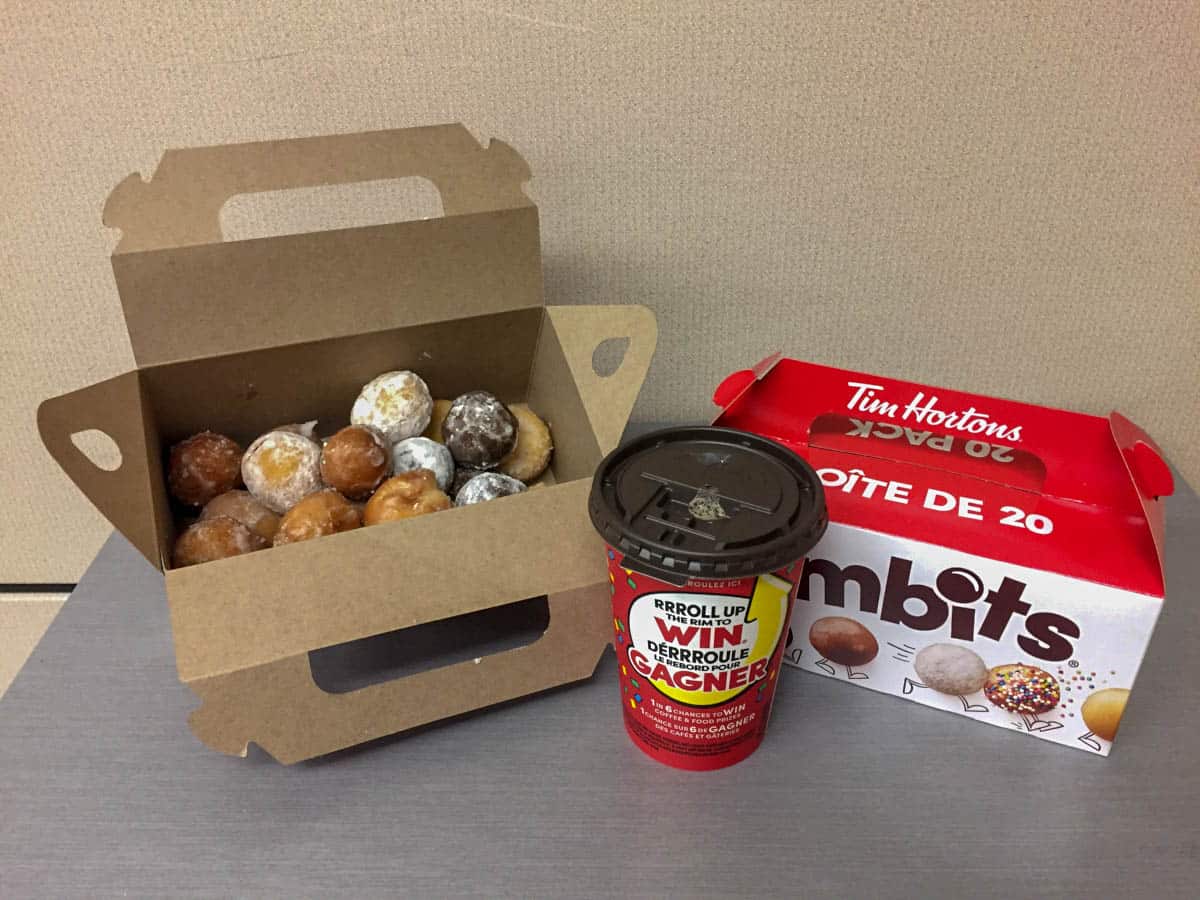 A box of Timbits and a double double coffee is one of the traditional Canadian foods you have to try A box of Timbits and a double double coffee is one of the traditional Canadian foods you have to try