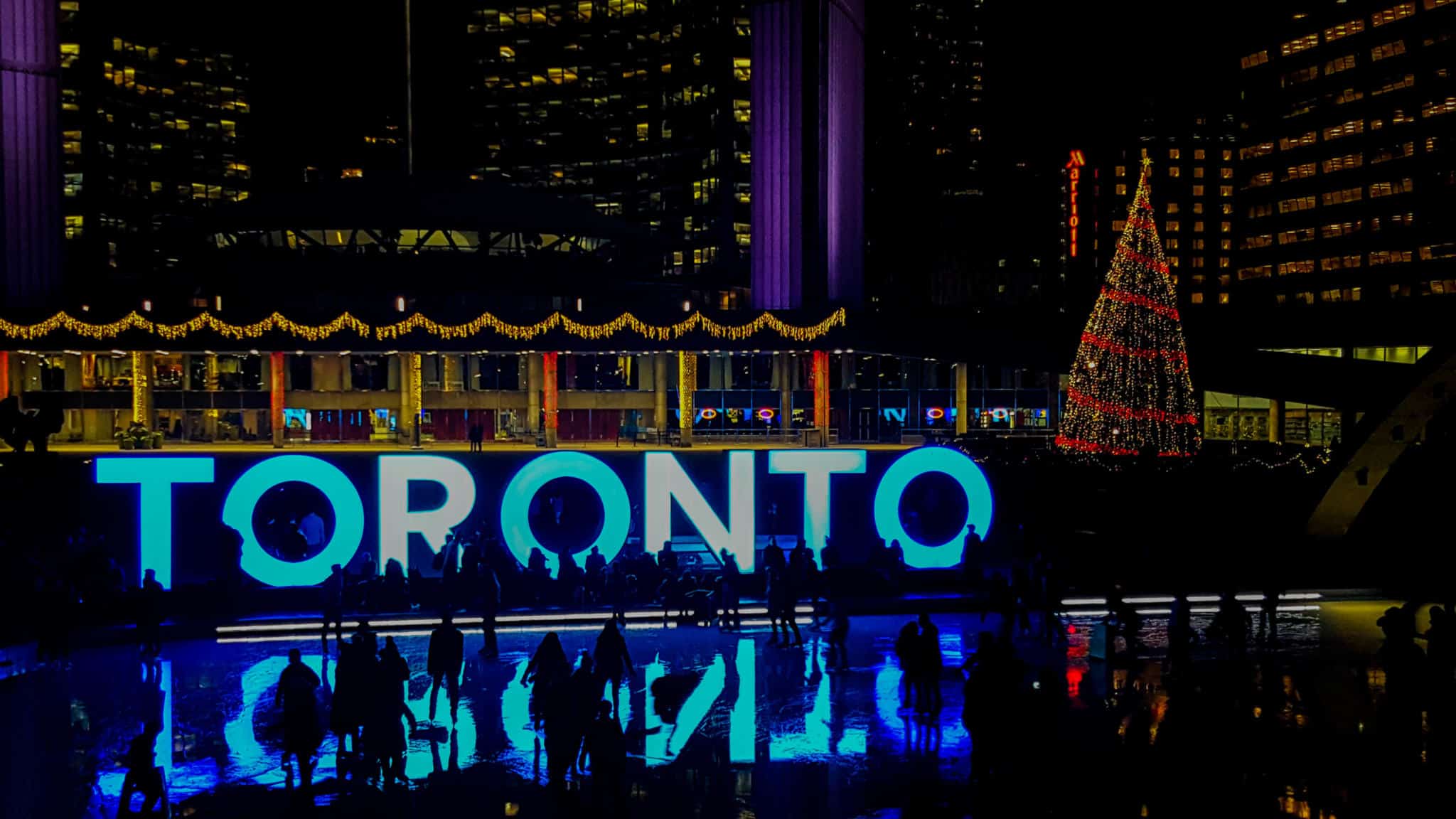 Taking a picture at the Toronto Sign is one of the free things to do in Toronto