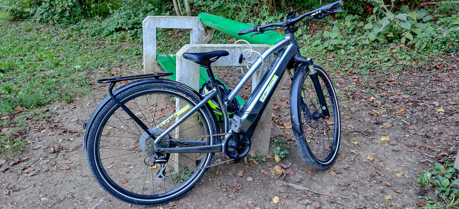Black electric bike used to bike around the lake