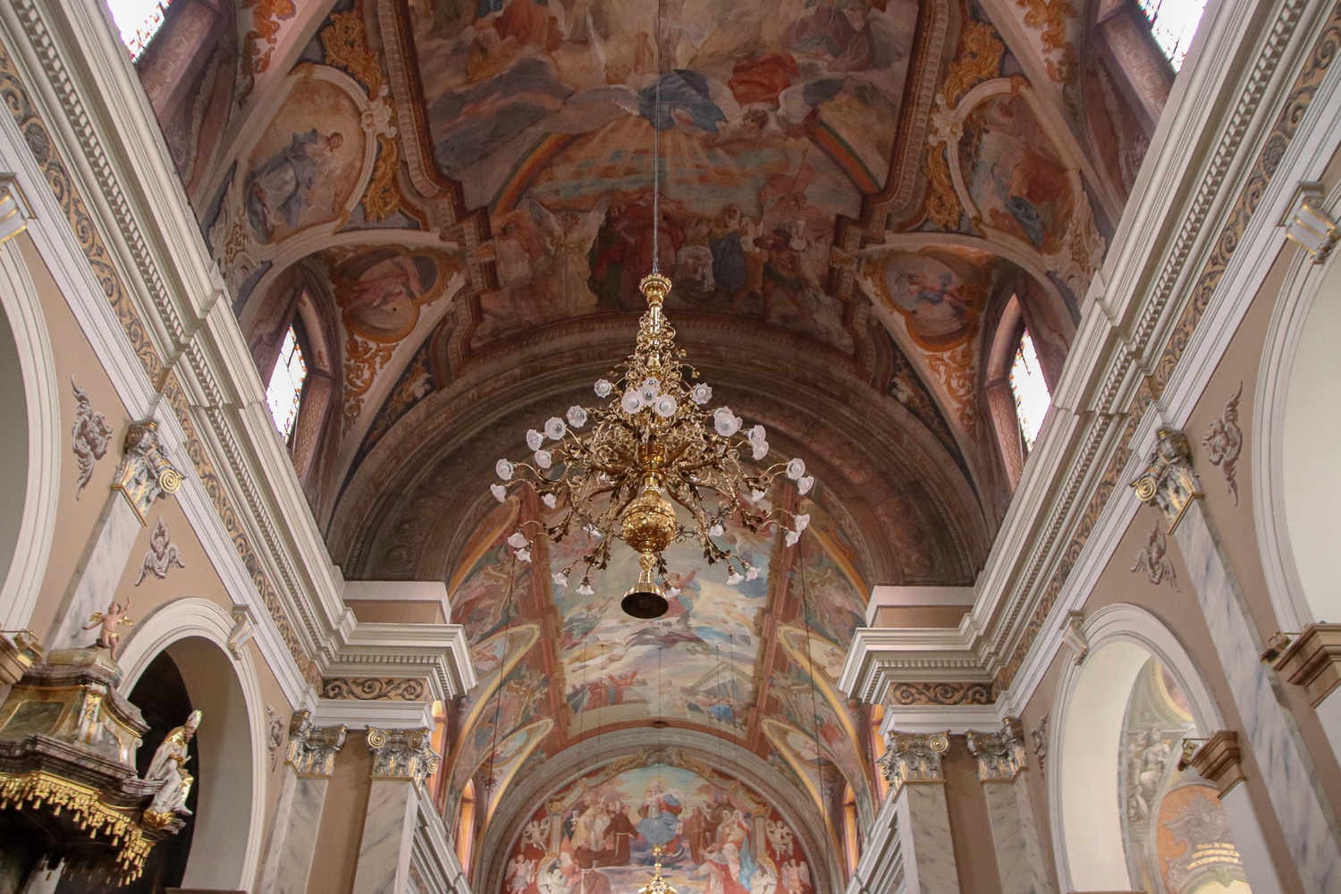 Visiting the pink Franciscan Church of the Annunciation is one of the things to do in Ljubljana
