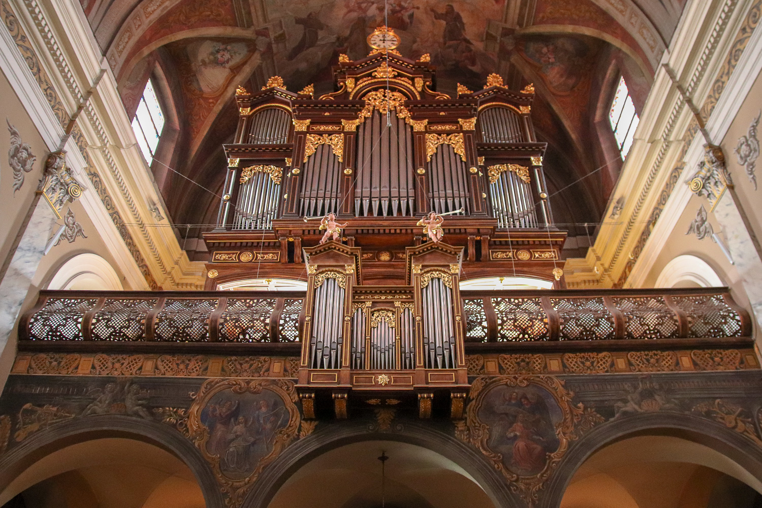 Visiting the pink Franciscan Church of the Annunciation is one of the things to do in Ljubljana