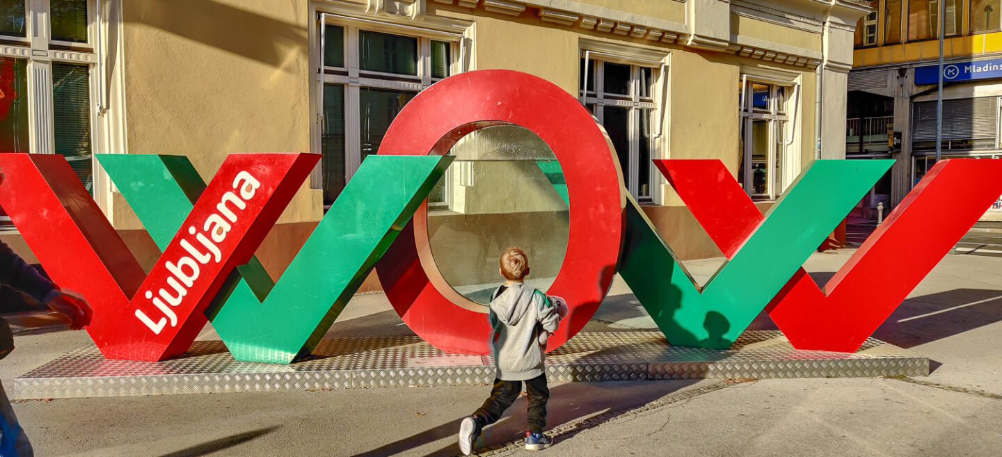 Taking a picture in front of the Wow sign is one of the things to do in Ljubljana