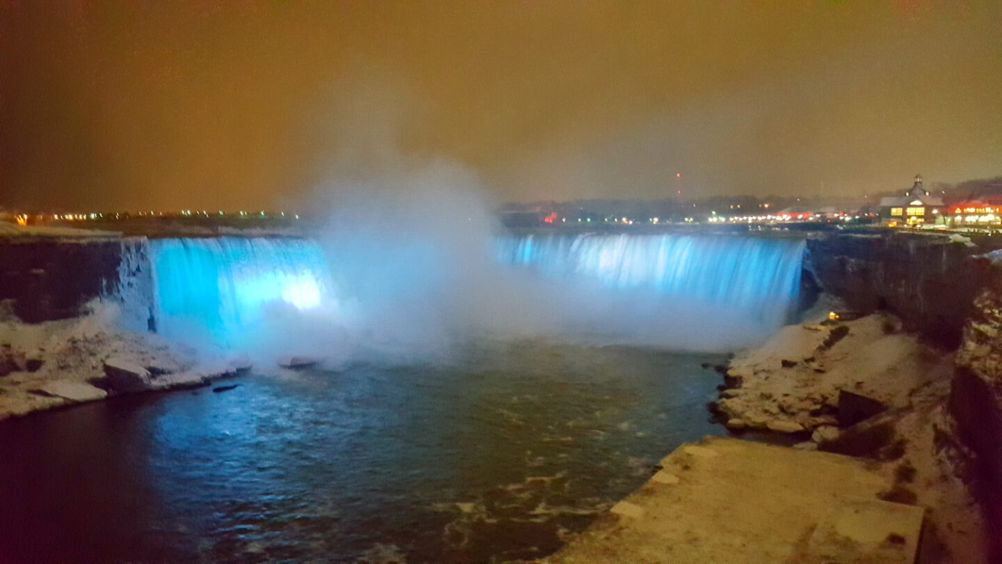 Lit up Niagara Falls. Niagara Falls is one of the day trips from Toronto I recommend.